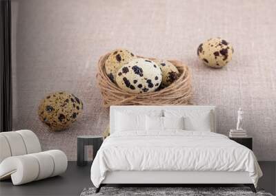 Traditional easter nest with eggs on a linen surface. Wall mural