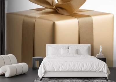 A beautifully wrapped golden gift box adorned with a satin ribbon isolated on transparent background. Wall mural