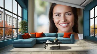 Close up portrait of beautiful joyful Caucasian female smiling, demonstrating white teeth, looking at the camera. Wall mural