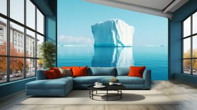 Large iceberg floating in calm arctic waters on a sunny day. Wall mural