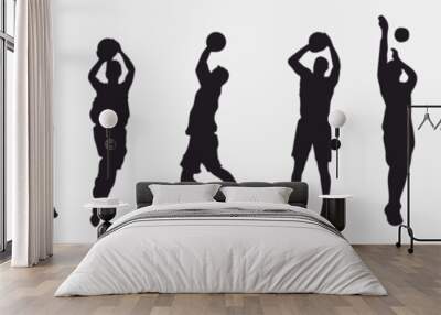 Basketball player. Collection of different basketball players in various pose.  Set of basketball players throwing ball isolated on white background  Wall mural