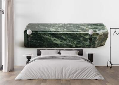 A simple flat polished green granit grave with headstone on white background Wall mural