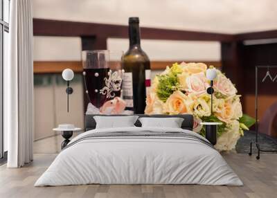 White and green wedding bouquet and glasses with bottle of wine Wall mural