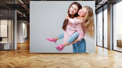 mother and daughter having fun together Wall mural