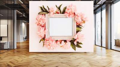 Pastel wooden frame decorated with coral peonies flowers, empty space for text Wall mural