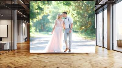 wedding couple on the nature in summer day. Wall mural