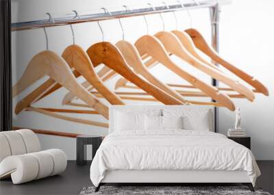 wooden empty hangers for clothes on rack on white background. no Wall mural