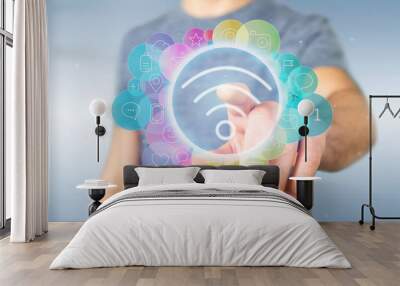 Businessman holding Wifi icon surrounding by colorfull social media icon 3d rendering Wall mural