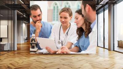 Medical team working at the hospital all together Wall mural