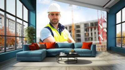 portrait of an attractive worker on a construction site Wall mural