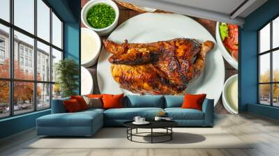 grilled chicken with french fries, fresh salad and homemade creams. Wall mural