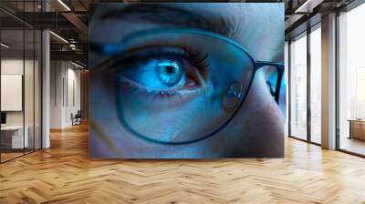 a close up of a person wearing glasses Wall mural