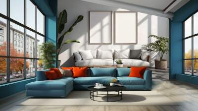 a living room with a couch and two large posters on the wall above it Wall mural