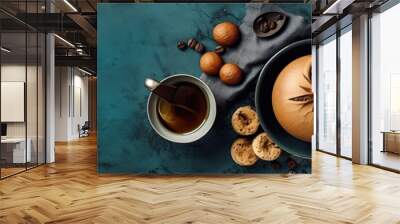 a tea pot and some nuts on a table Wall mural