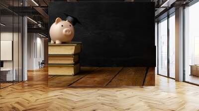 piggy bank and book. college fees saving concept, copy space for text Wall mural