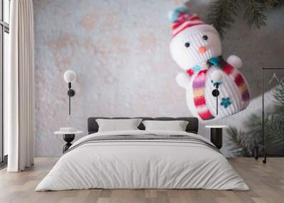 Snowman on a wooden background. New Year's still life. Wall mural