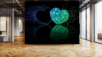 Two blue and green hearts on black background with reflection effect Wall mural