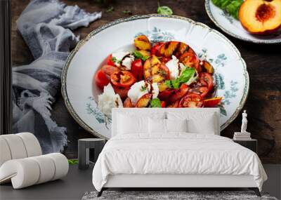 Grilled peach salad with mozzarella and tomatoes Wall mural