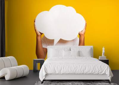 African american man holding an empty speech bubble Wall mural