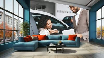 African American Woman Buying Car In Auto Dealership Center Wall mural