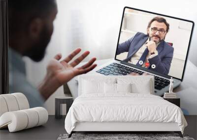 African Businessman Making Video Call Communicating With Coworker From Home Wall mural