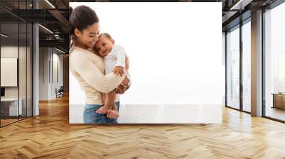 African Mother Holding Baby Boy In Arms Standing Indoors Wall mural