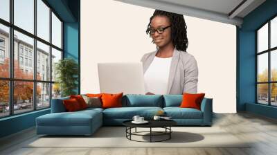 Afro Businesswoman Working At Laptop Sitting On White Background Wall mural