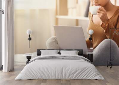 Afro Woman Using Laptop Having Coffee In Bed, Panorama, Cropped Wall mural