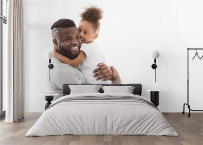 Beautiful afro family posing over white background Wall mural