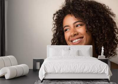 Beauty portrait of black woman on light background Wall mural