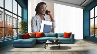 Black female job seeker talking on cellphone and holding CV Wall mural