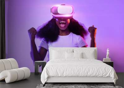 Black lady in VR glasses exploring cyberspace, shouting in excitement Wall mural