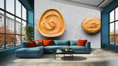 Bowls and spoon with peanut butter Wall mural