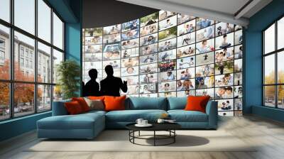 Broadcasting Concept. Digital wall with different channels and people Wall mural