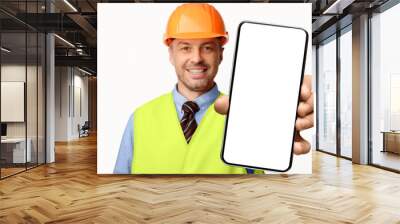 Building Services. Construction Worker Showing Cellphone Empty Screen Smiling To Camera Standing On White Studio Background. Selective Focus, Mockup Wall mural