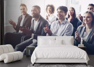 Business audience applauding to speaker at conference Wall mural