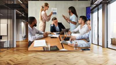 Business Conflicts. Two Female Employees Arguing During Corporate Meeting In Office Wall mural