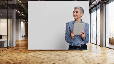 Business Opportunities. Confident Middle-Aged Businesswoman With Digital Tablet Looking At Copy Space Wall mural