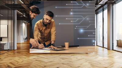 Busy confident serious european adult male engineers, businessmen make notes, talk about work Wall mural