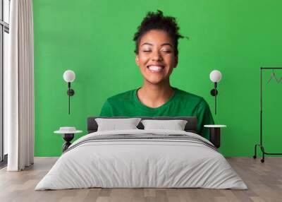 Close up portrait of laughing afro woman Wall mural