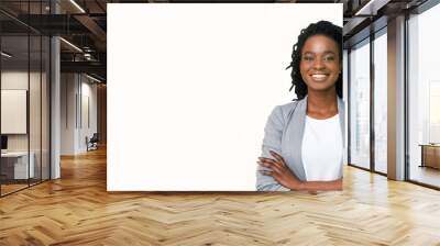 Confident afro businesswoman posing with folded arms on white background Wall mural