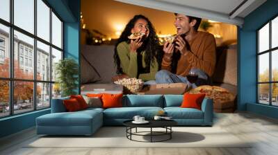 Couple Eating Pizza Watching Film Using Home Cinema Projector Indoor Wall mural