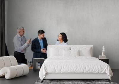 Coworkers Communicating Standing During Business Meeting In Modern Office, Banner Wall mural