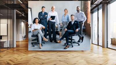 Coworkers Smiling To Camera Posing In Modern Office Wall mural