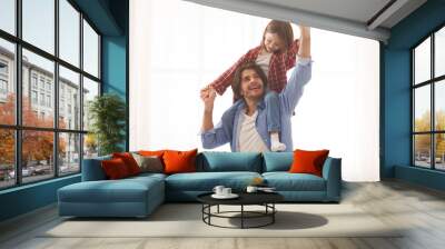 Cute little girl playing with her cheerful father Wall mural