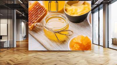 Different varieties of sweet golden fresh honey Wall mural