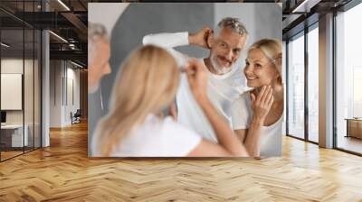 Family Skincare. Mature Spouses Making Daily Beauty Routine In Bathroom Wall mural