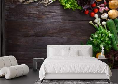 Frame of fresh vegetables on wooden background with copy space Wall mural