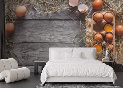 Fresh brown eggs in carton on rustic wood background Wall mural