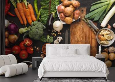 Fresh organic vegetables on wood background. Wall mural